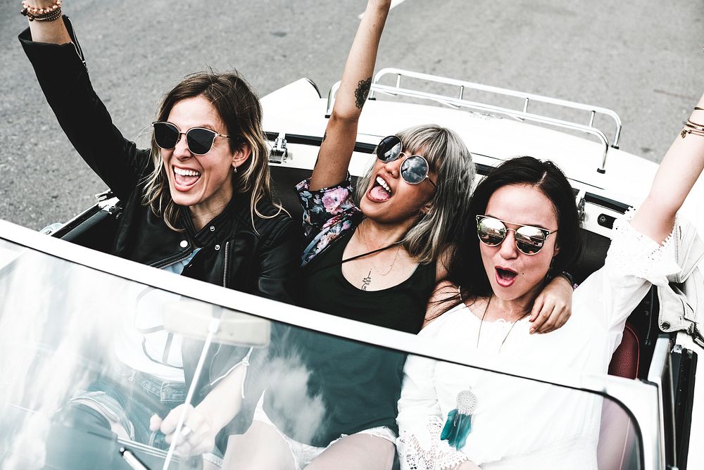 Diverse women enjoying a road trip and festival