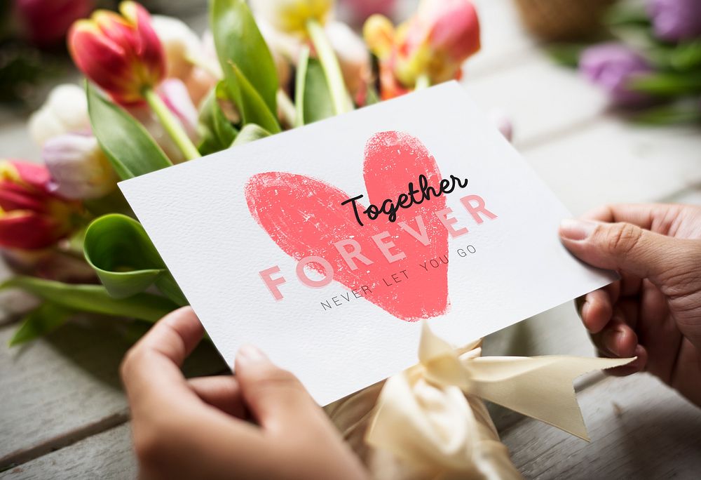 Bouquet of flowers with a together forever card