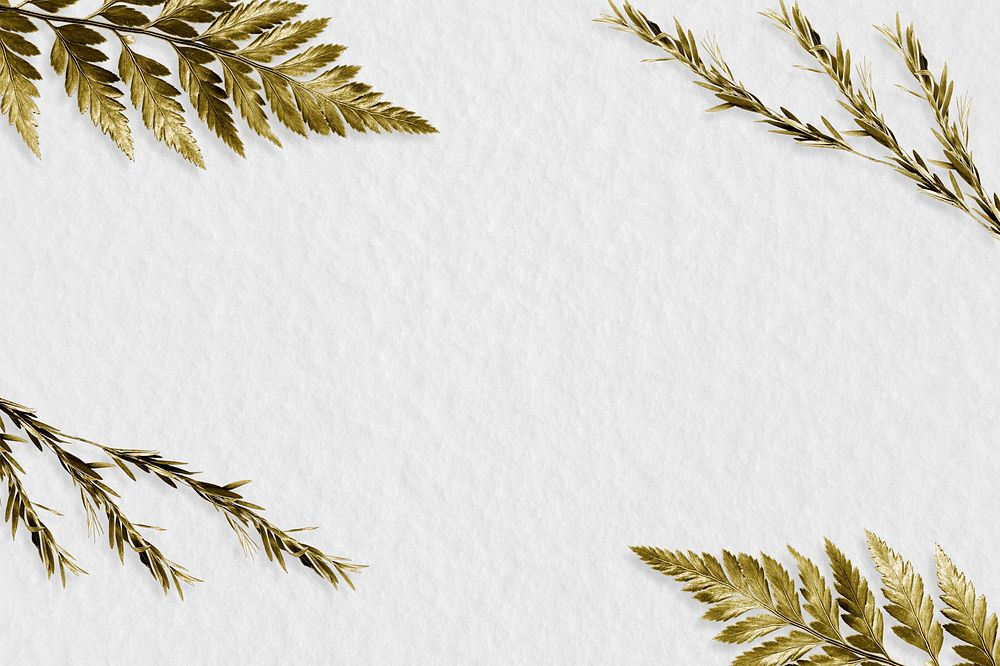 Gold leatherleaf fern frame on white background