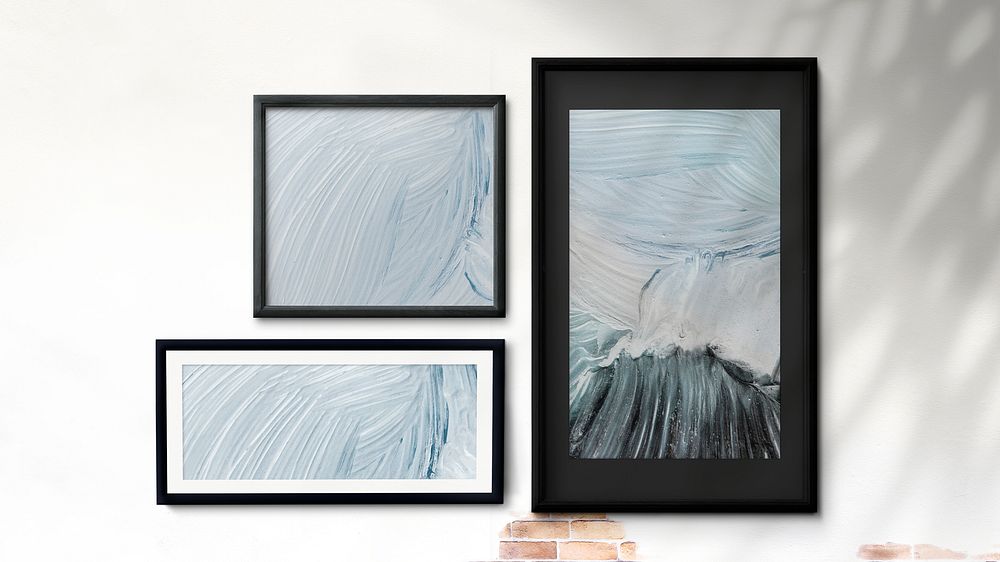 Picture frames hanging on a white wall illustration