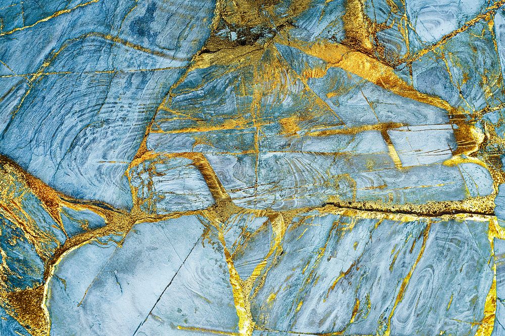 Blue and gold marble textured background