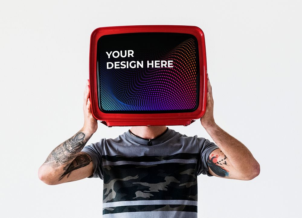 Man with a tattoo holding a television mockup