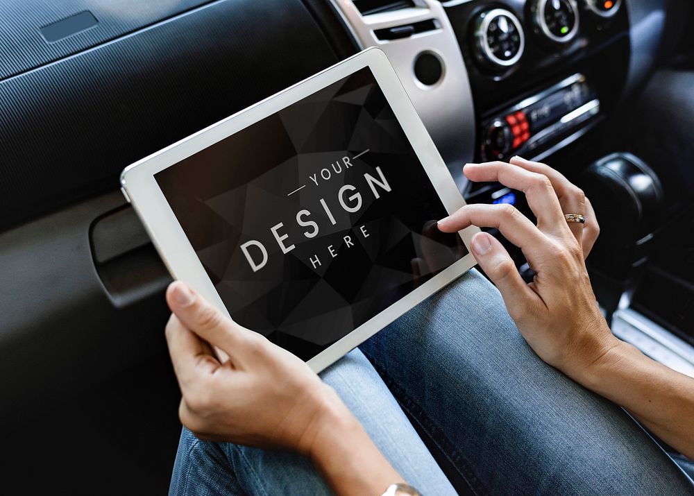 Woman using a digital tablet screen mockup in a car