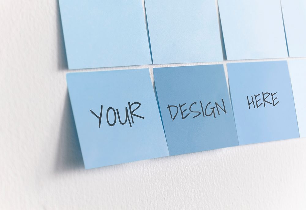 Blue sticky note mockups on a white wall