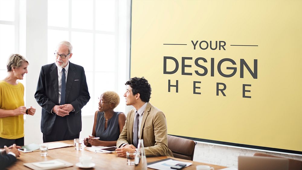 Diverse business people in a meeting with a board mockup