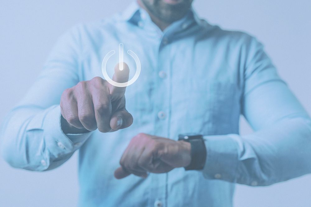 Man in a blue shirt using his smartwatch mockup