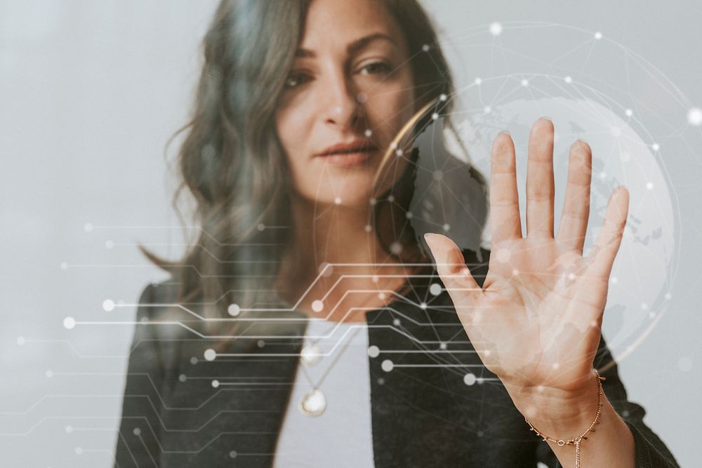 Woman touching a screen with her palm mockup