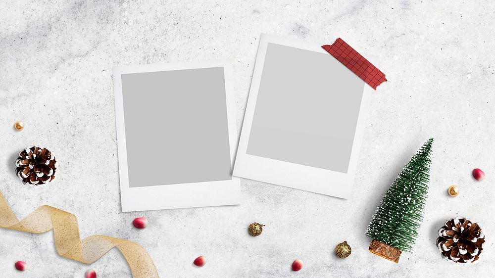 Blank photo frames mockup with Christmas decorations on cream background