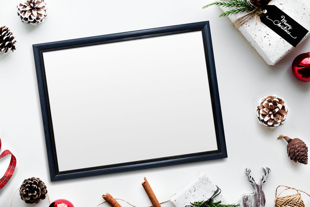 Wooden frame mockup with Christmas decorations