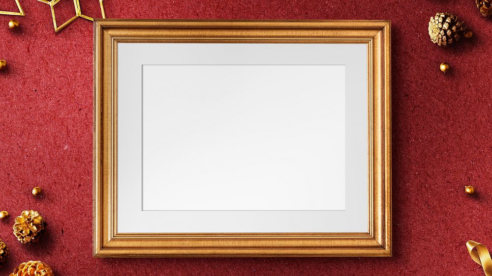 Classic gold frame mockup with Christmas decorations