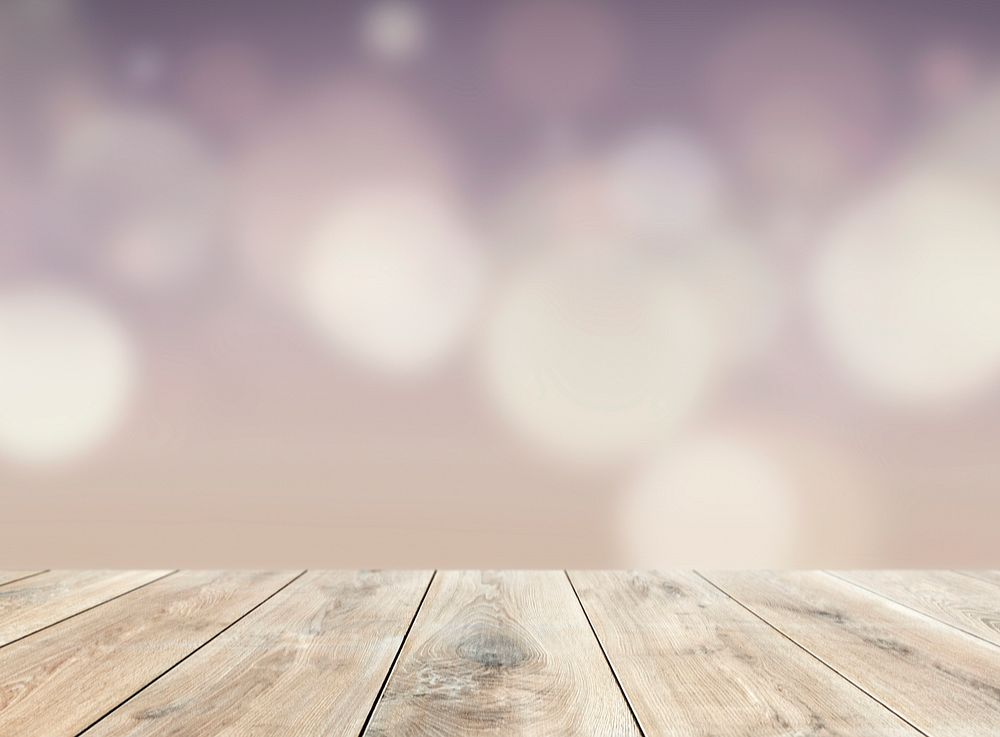 Beige wooden planks  with bokeh lights background
