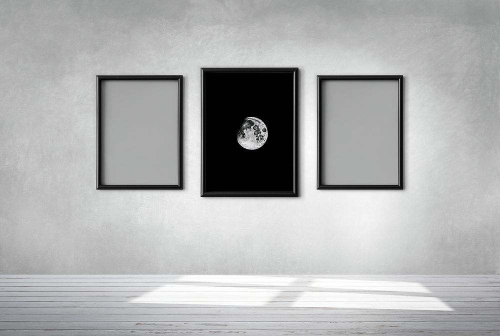 Moon in a frame mockup against a gray wall