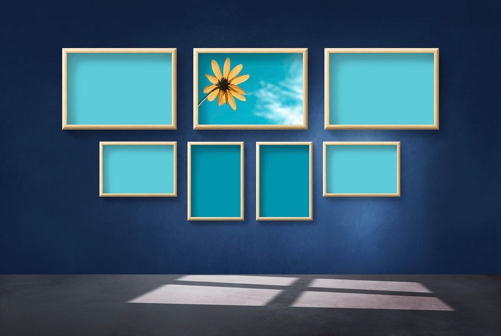 Modern frame mockups on a blue wall