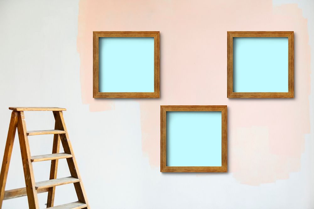 Wooden frame mockups on a wall