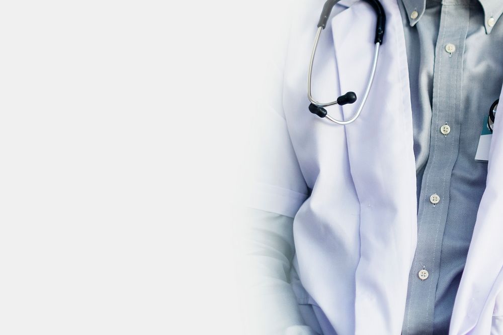 Stethoscope on a doctors gown background