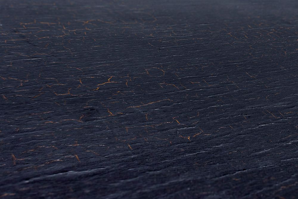 Scratched navy blue wooden textured flooring background