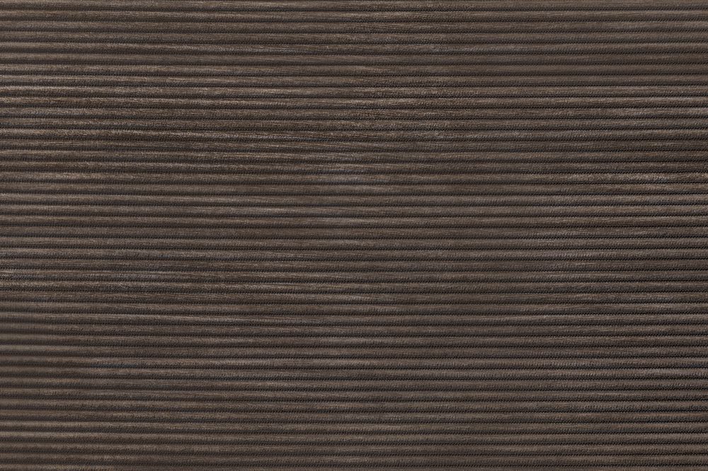 Dark brown corduroy fabric textured background
