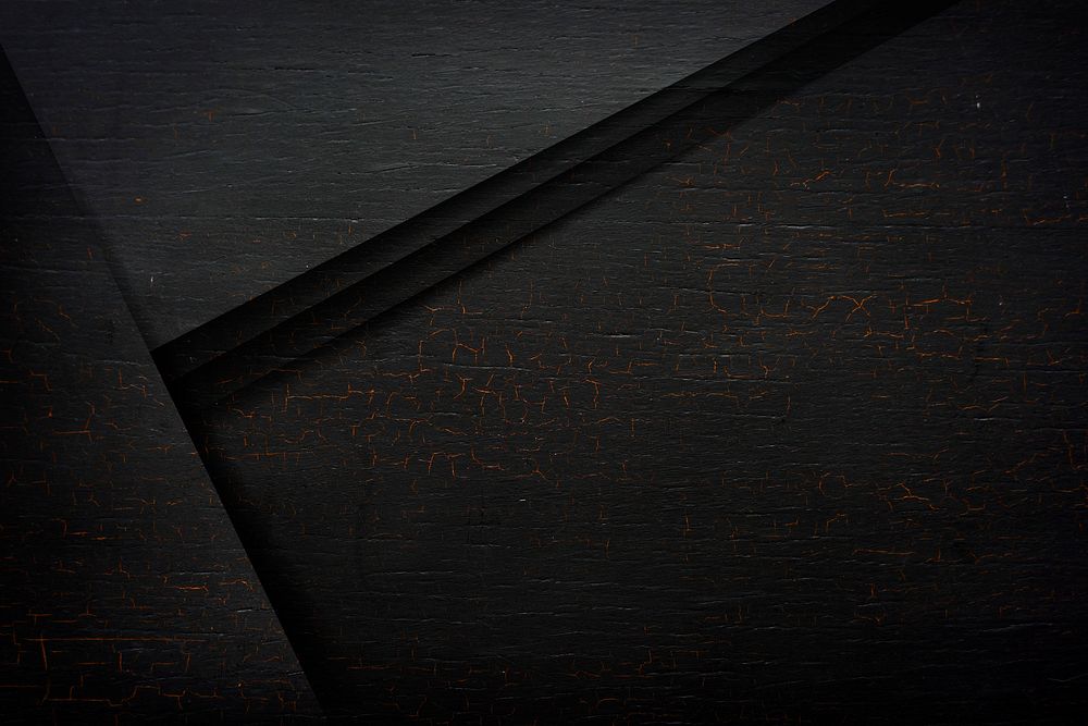Cracked black wooden textured background