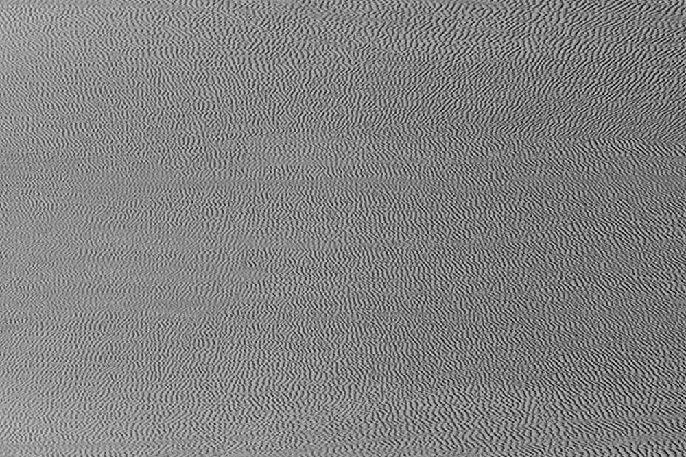 Grain textured gray fabric backdrop