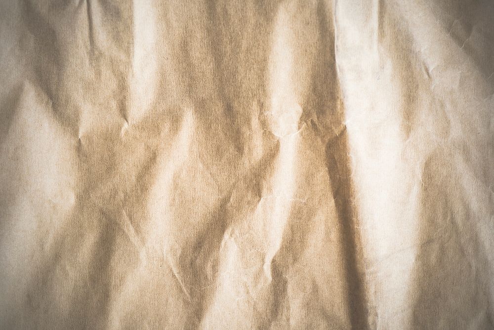 Brown scrunched paper textured background
