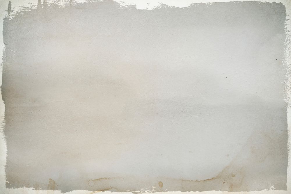 Brown stained on a gray paper background