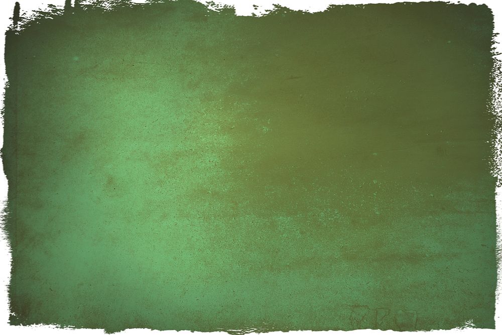 Brown stained on a green paper background