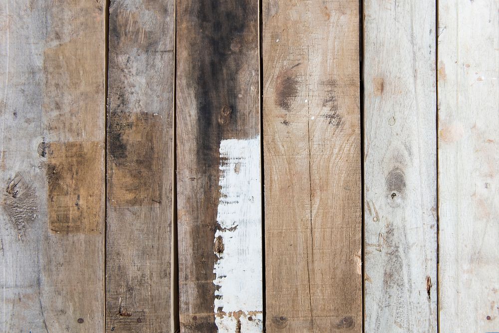 Scratched brown wooden plank textured background