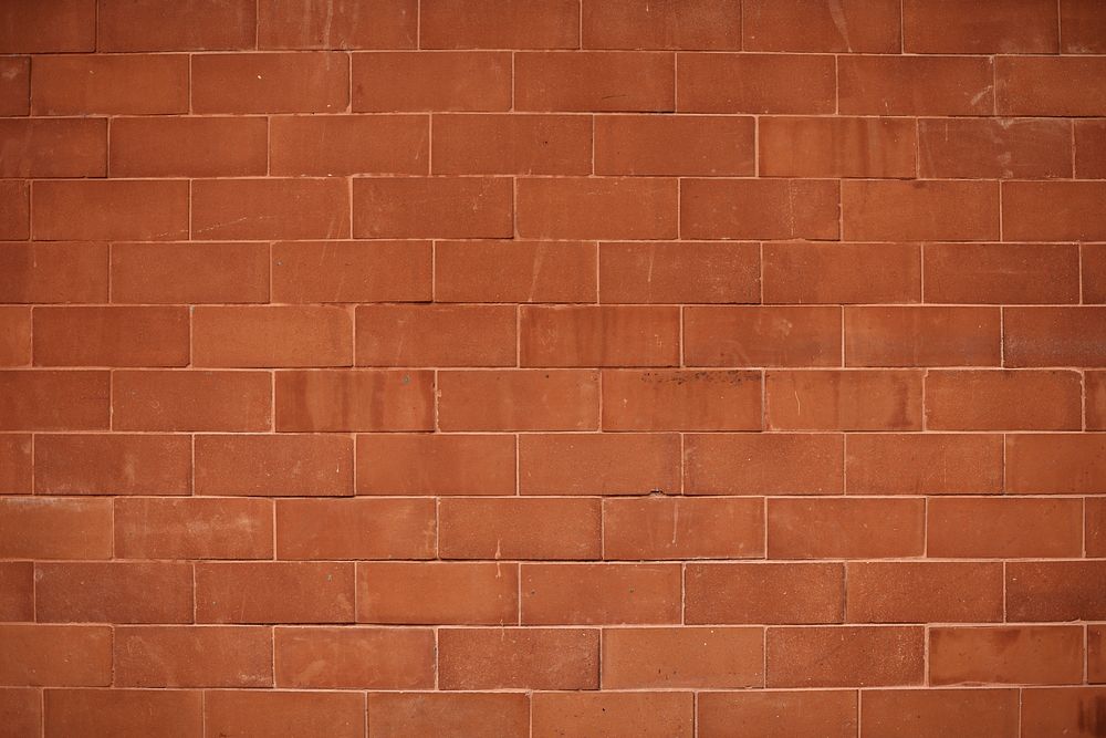 Reddish orange brick wall textured background