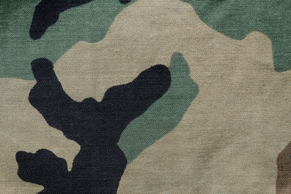 Military camouflage fabric textured background