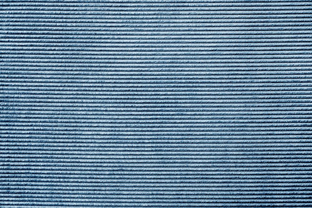 Blue rug fabric textured background