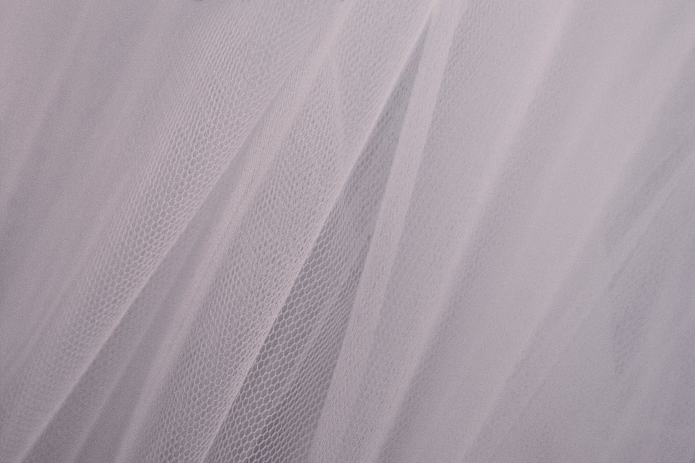 Hanging drape with net textured background