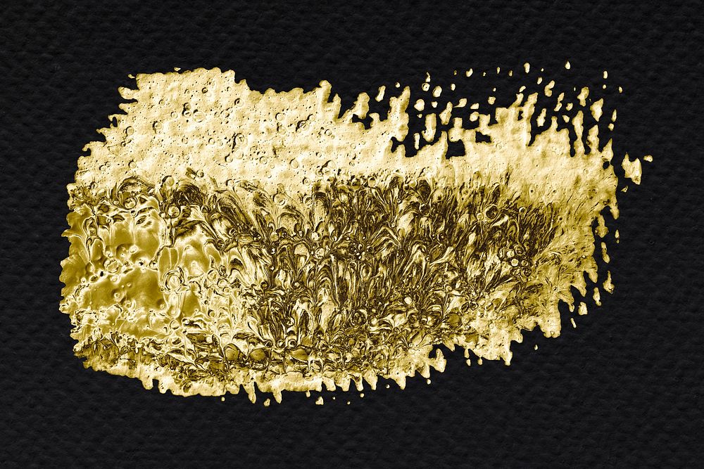 Golden shimmering brush stroke background