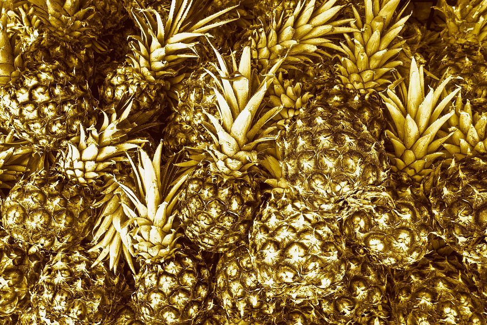 Luxurious golden pineapple fruit background