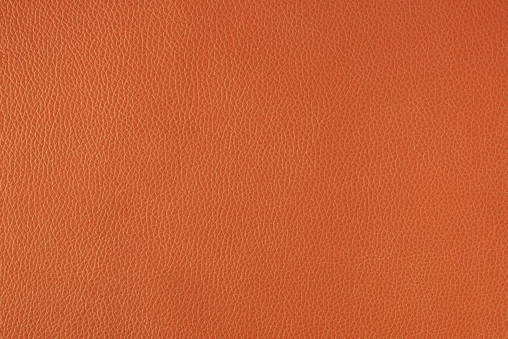 Orange fine leather textured background