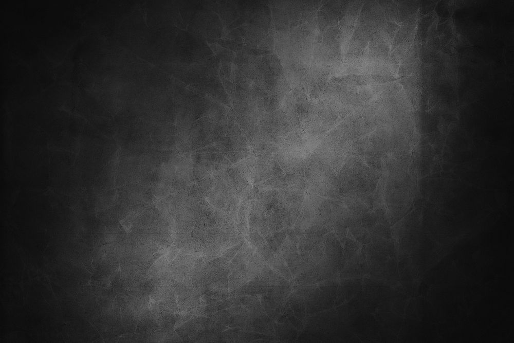 Black scratched textured paper background