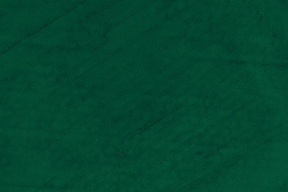 Crumpled pine green paper textured background