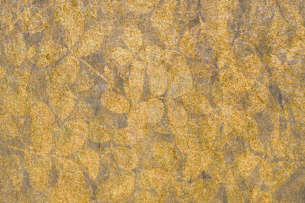 Metallic gold leaves patterned background