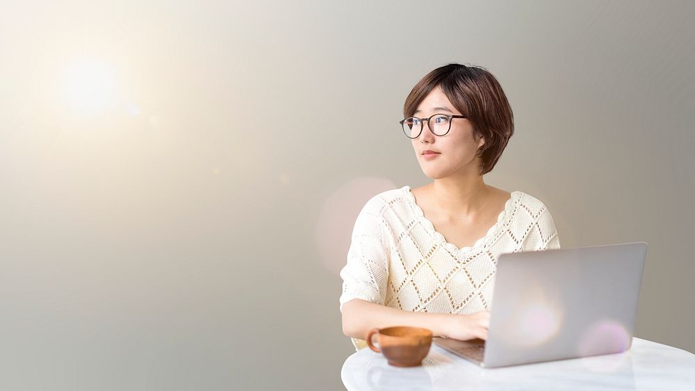 Asian woman using a laptop