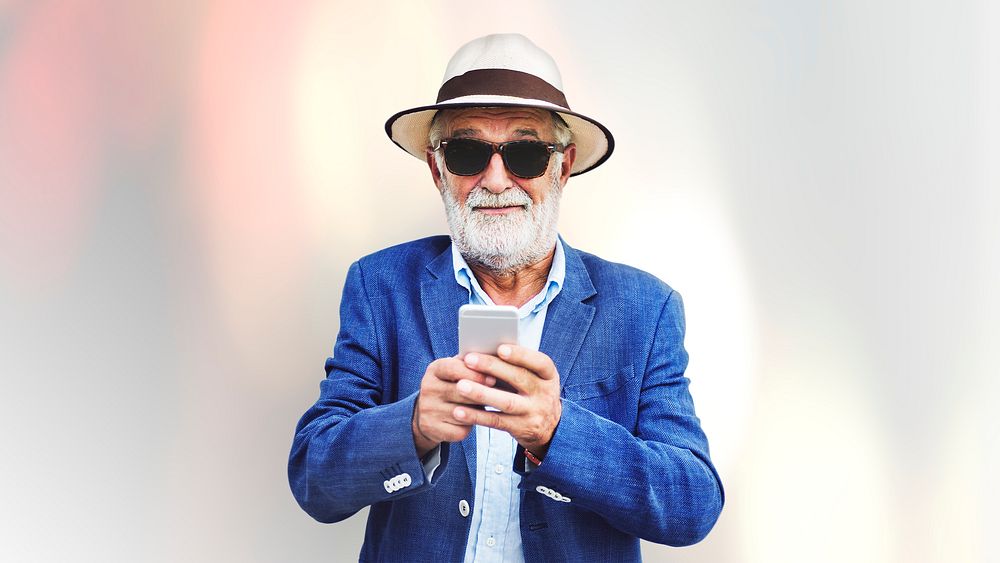 Elderly man using a mobile phone