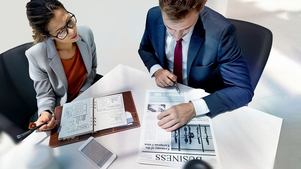 Business people discussing stock market