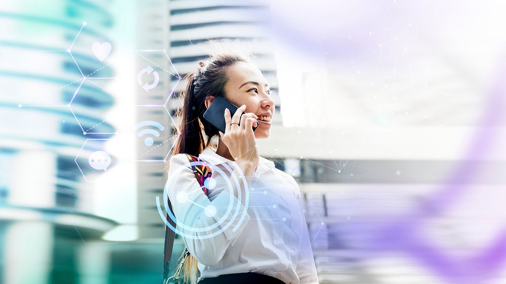 Asian businesswoman in a city on the phone