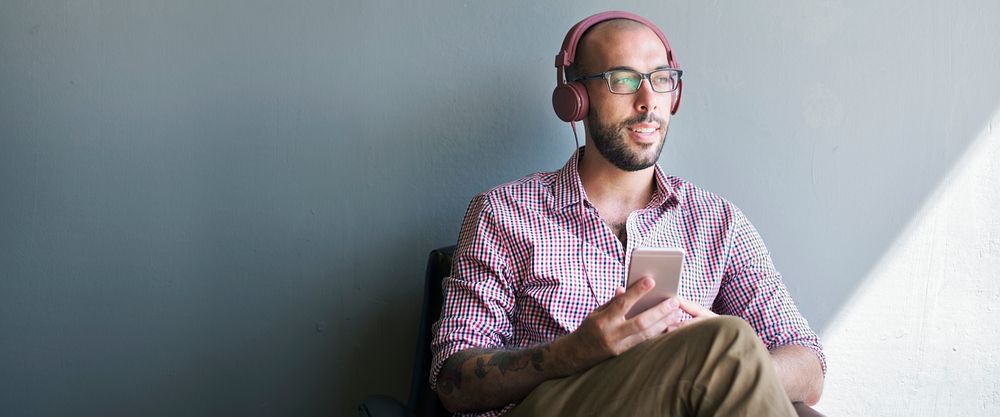 Man listening to music from his phone