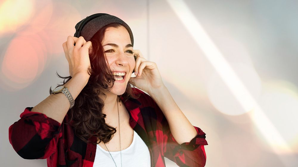 Woman enjoying the music through her headphones