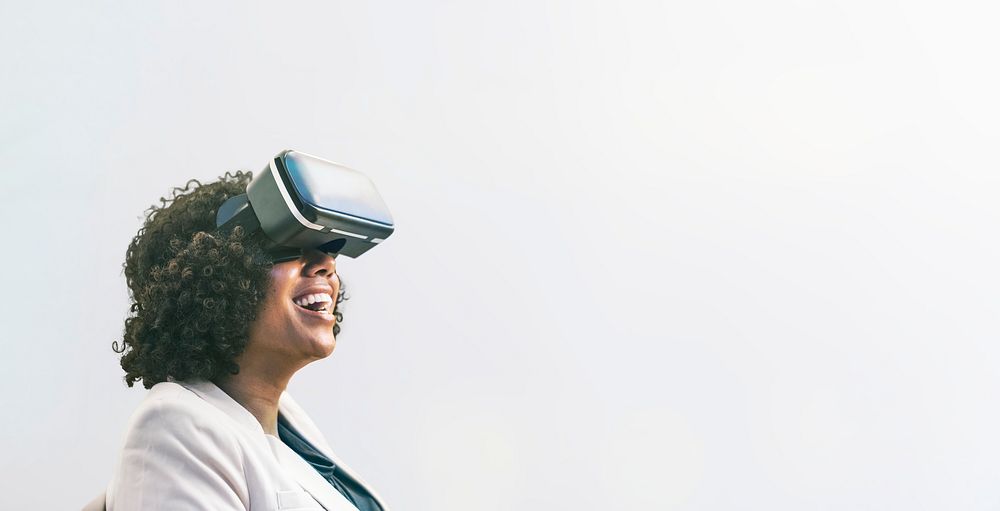 Black woman enjoying VR headset