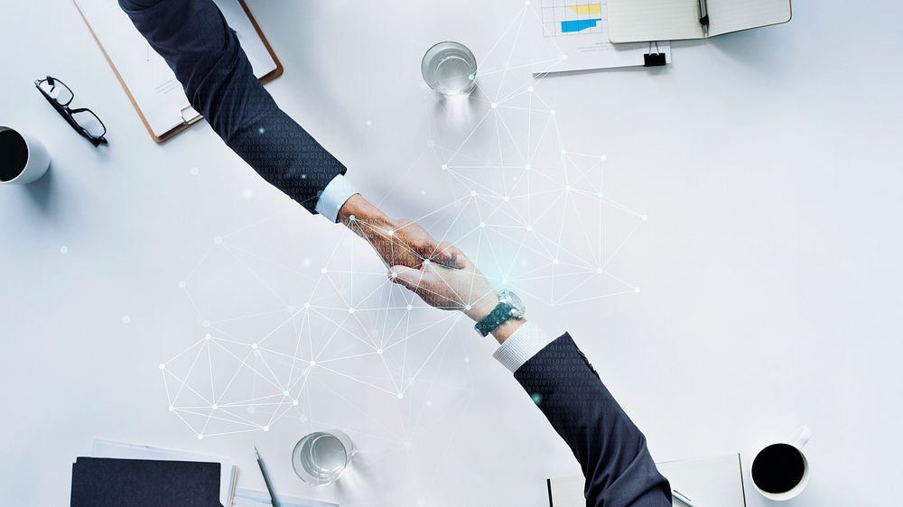 Business people shaking hands for a business deal