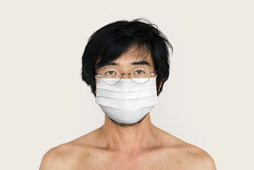 Asian man wearing a face mask during coronavirus pandemic mockup