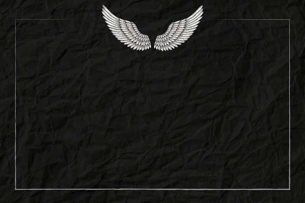 Angel wings frame on a black paper textured background