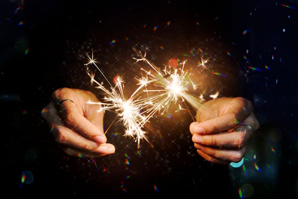 Man celebrating diwali with sparklers 