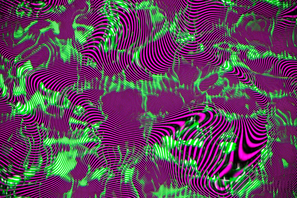 Magenta and neon green fluid background design 