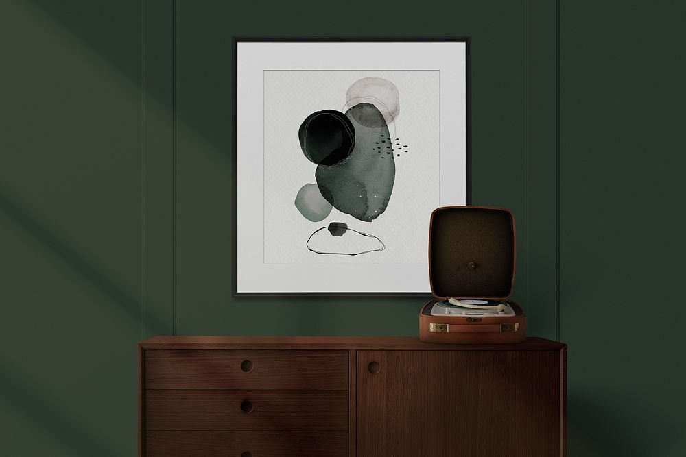 Modern frame mockup with abstract paint on the dark green wall
